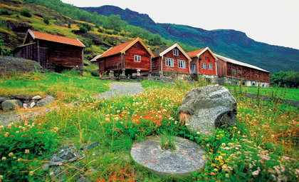 Houten huisjes in Flam